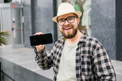 Young man using mobile phone