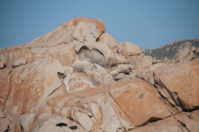 Rock formations in desert against clear sky