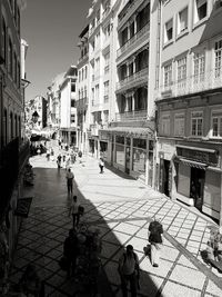 People walking on street in city