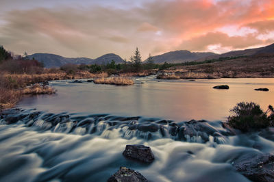 Sunrise scenery, river and mountains, derryclare reserve, connemara, galway, ireland 