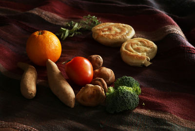 Close-up of oranges on table