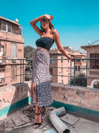 Fashion model posing in a rooftop