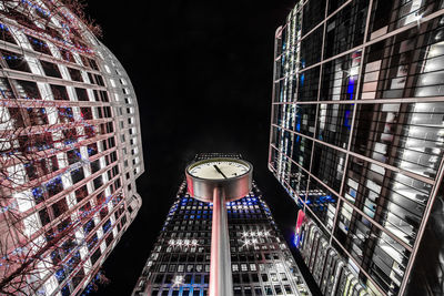 Low angle view of illuminated building at night