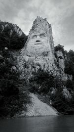 Low angle view of statue against sky