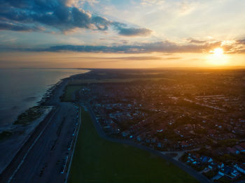 High angle view of river against sky during sunset