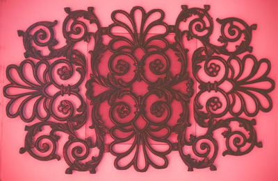 Close-up of red object on wall