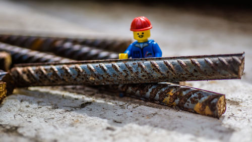 Close-up of toy on rusty metal