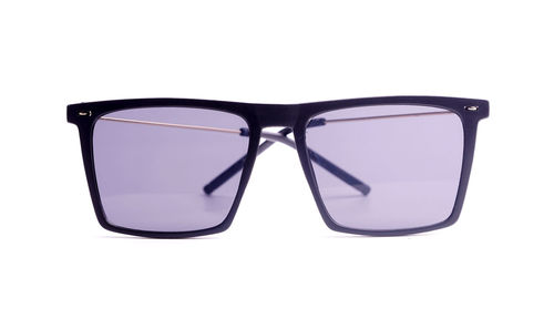 Close-up of sunglasses against white background