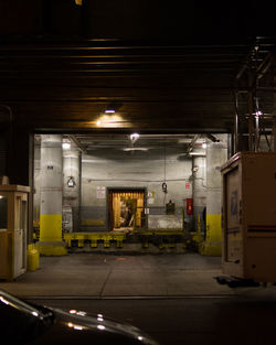 Illuminated parking lot in city at night