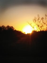 Scenic view of silhouette landscape against sky during sunset