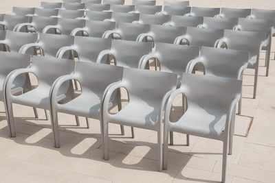 Empty auditorium chairs outdoors