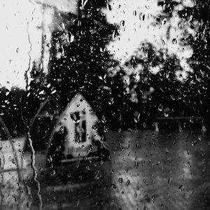 Close-up of water drops on glass window