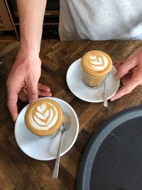 High angle view of coffee cup on table