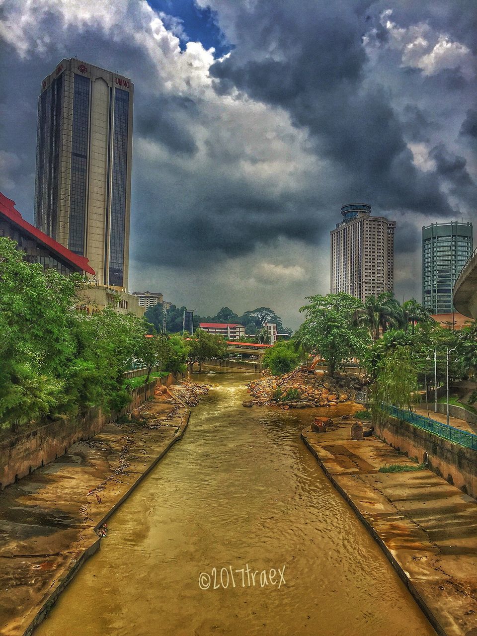 ROAD BY CITY AGAINST SKY