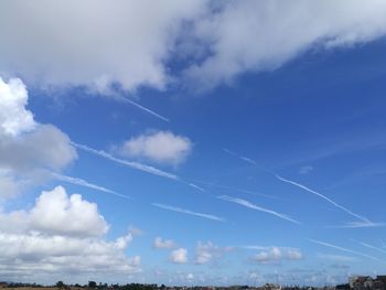 Low angle view of vapor trail in sky