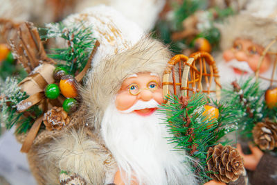 Close-up of figurine on christmas tree