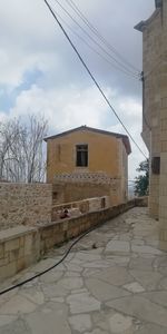 Houses and buildings against sky