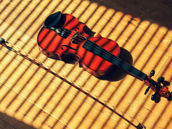 High angle view of guitar on table