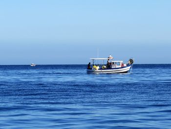 Boat sailing in sea