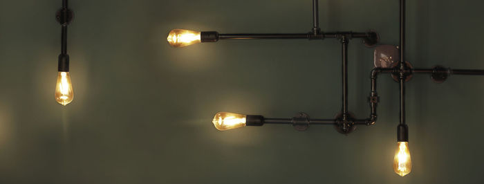 Close-up of illuminated light bulb