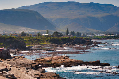Scenic view of sea and mountains
