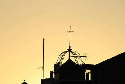 High section of built structure against clear sky