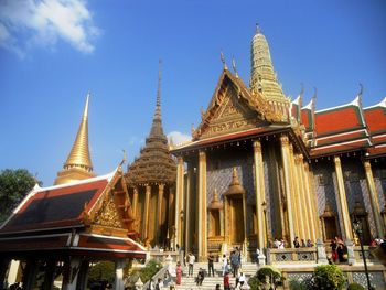 Low angle view of pagoda against blue sky