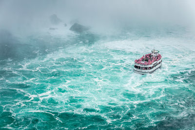 Boat sailing in sea