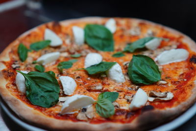 Close-up of pizza served in plate