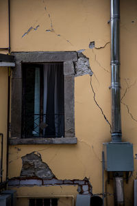 Broken window of old building