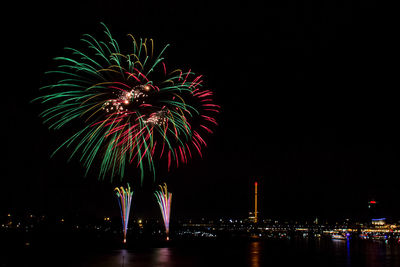 Firework display at night