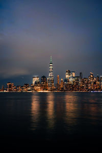 Illuminated buildings in city at night