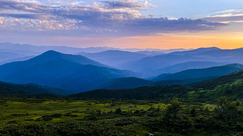 Scenic view of landscape against sky during sunset