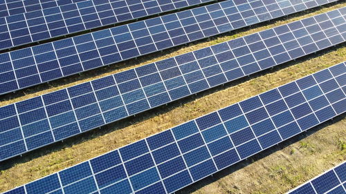 Aerial drone view flight over solar power station panels. aerial top view of solar farm. r.