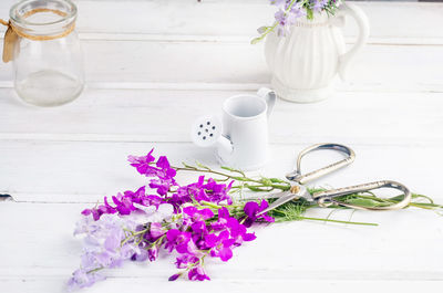 Close-up of white flower pot on table