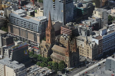 High angle view of street amidst buildings in city