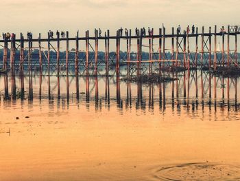 Pier on sea against sky