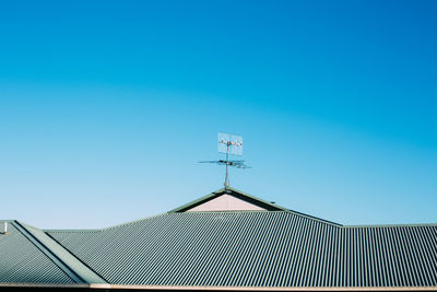 Low angle view of building against blue sky