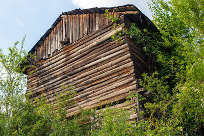 Abandoned wooden house in the woods