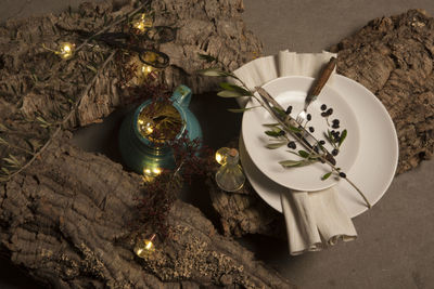 High angle view of illuminated lamp on table