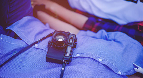 High angle view of couple with camera