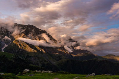 Scenic view of landscape against sky during sunset