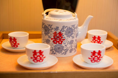 Close-up of coffee cup on table