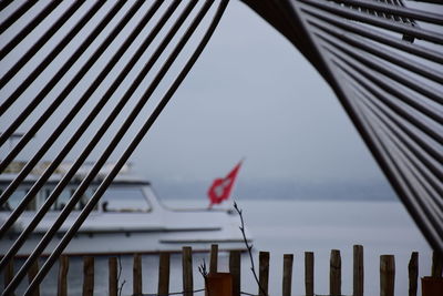 Low angle view of flag against sky