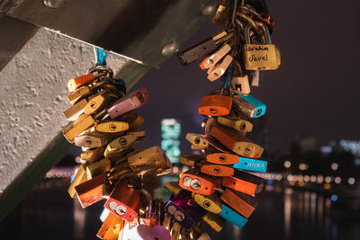 Close-up of padlocks hanging on metal