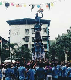 Group of people in front of building