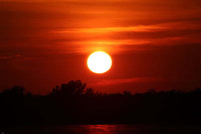 Scenic view of dramatic sky during sunset