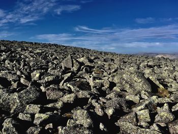 Scenic view of rocky landscape against sky