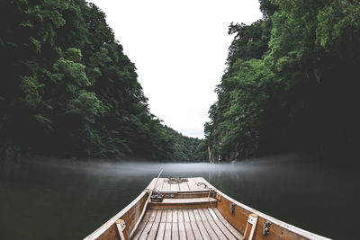 Pier over lake against mountain