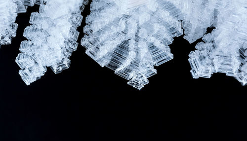 Close-up of ice crystals against black background